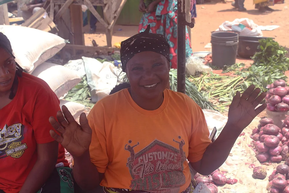 happy facial expression photo — A smiling market woman at the Monday Market in Kakuri, Kaduna 01