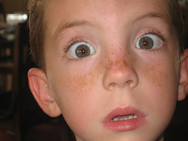shocked facial expression photo — Fear has big eyes