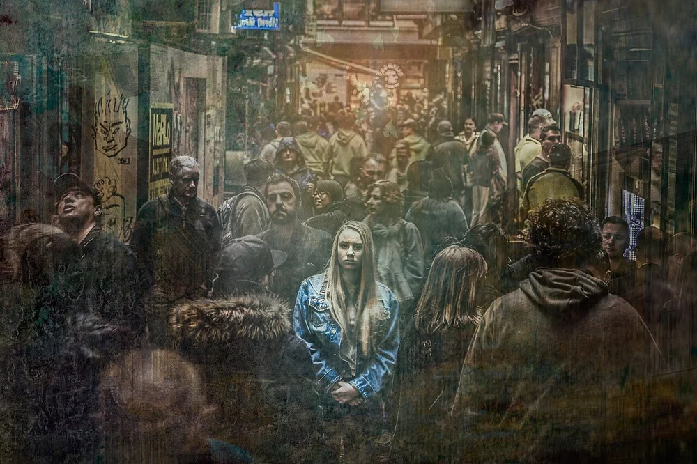 sad facial expression photo — Loneliness in a Crowd